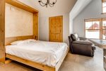 Murphy bed folds down and provides additional sleeping area